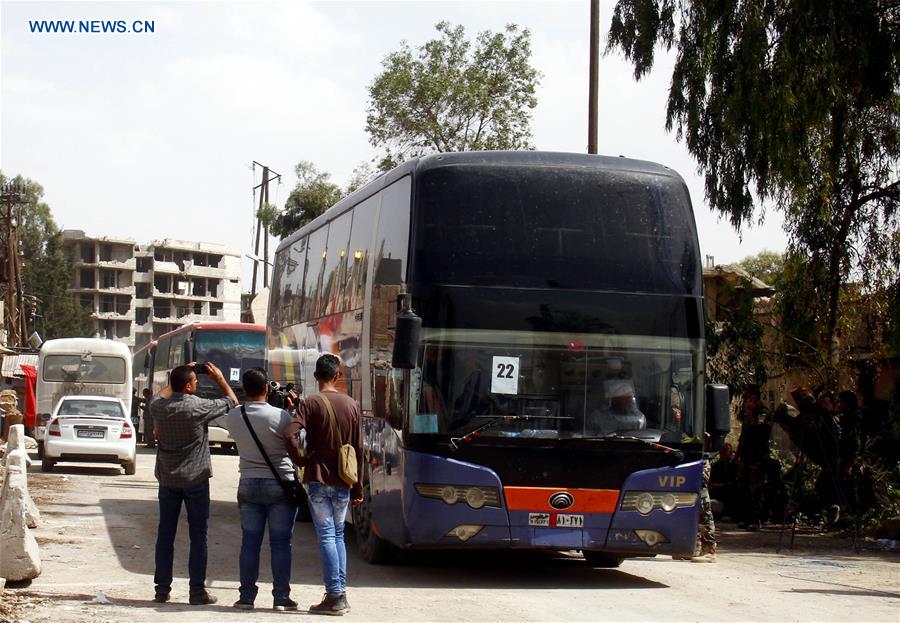 SYRIA-DAMASCUS-REBELS-EVACUATION