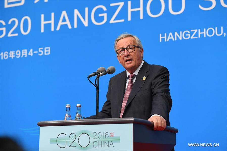 European Commission President Jean-Claude Juncker (R) speaks during the EU Delegation press conference of the G20 Summit in Hangzhou, capital of east China's Zhejiang Province, Sept. 4, 2016. (Xinhua/Li He) 