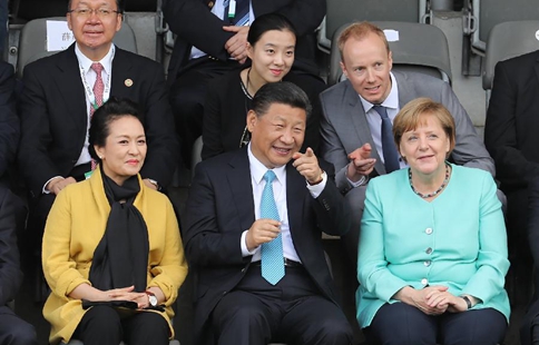 Xi, Merkel watch friendly football match between Chinese, German youth teams